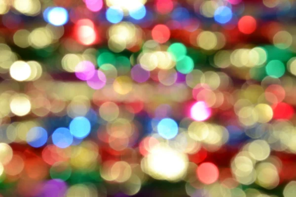 Helder en abstracte wazig kleurrijke achtergrond met glinsterende glitter — Stockfoto