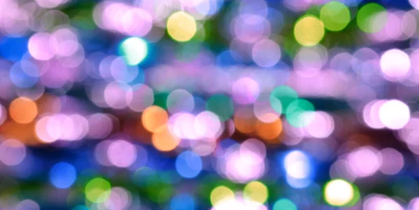 Luminoso e astratto sfondo sfocato colorato con scintillante glitter — Foto Stock