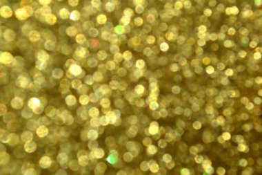 Parıldayan ile parlak ve soyut yıldız altın arka plan bulanık glitter