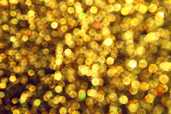 Bright and abstract blurred star golden background with shimmering glitter — Stock Photo, Image