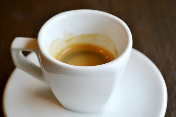 Small white cup of espresso coffee — Stock Photo, Image