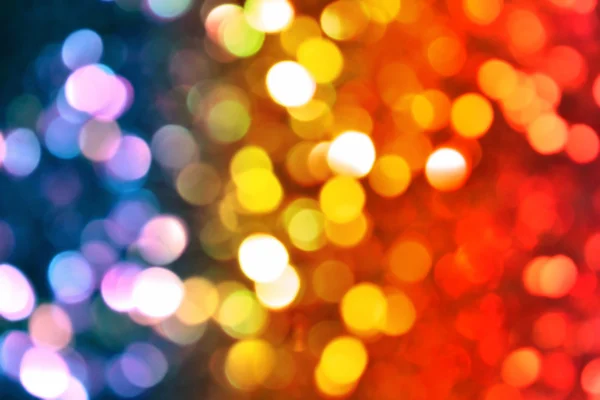 Bright and abstract blurred colorful rainbow background with shimmering glitter — Stock Photo, Image