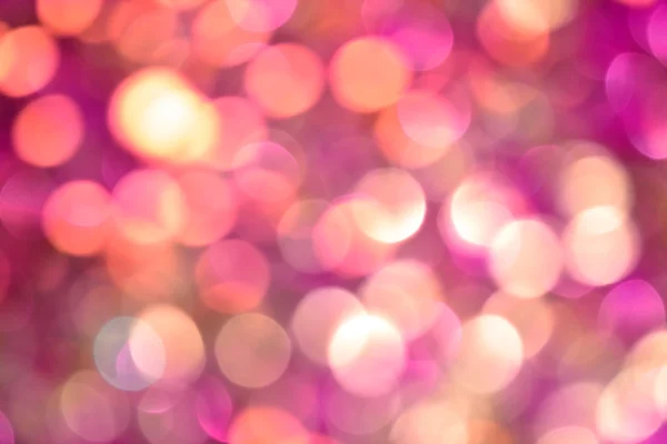キラキラ輝くと明るく抽象のぼやけたピンクの背景 — ストック写真