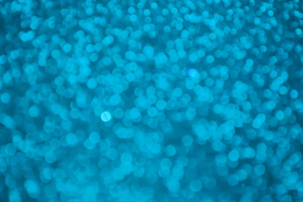 Helle und abstrakte verschwommene meerblaue Hintergrund mit schimmerndem Glitzern — Stockfoto