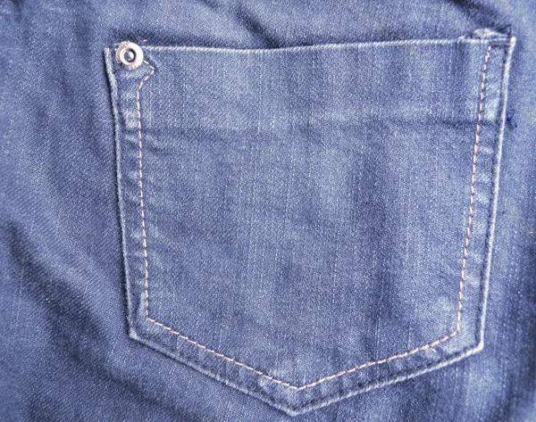 Velho jeans azul com bolsos — Fotografia de Stock