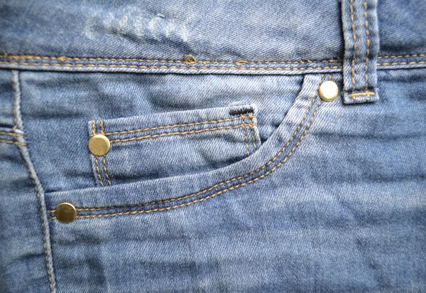 Stary niebieskie dżinsy z kieszonkami — Zdjęcie stockowe