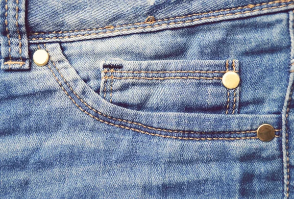 Старі блакитні джинси з кишенями — стокове фото