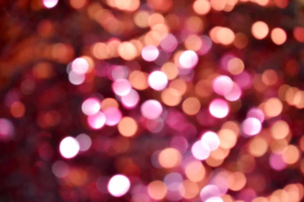 Jasny i streszczenie niewyraźne purpurowe tło z połyskujących świecidełka — Zdjęcie stockowe