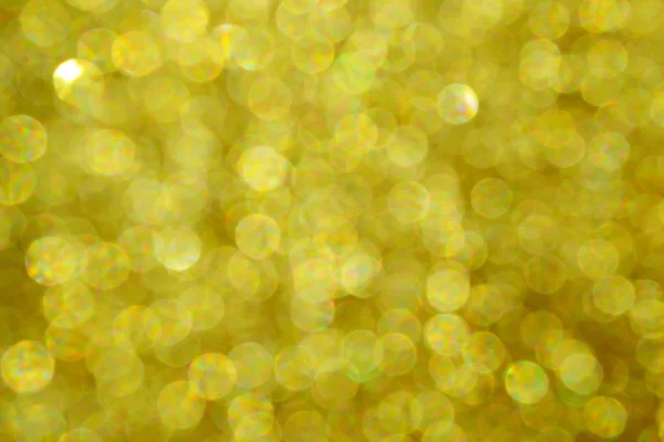 Helle und abstrakte verschwommene Sterne goldener Hintergrund mit schimmerndem Glitzern — Stockfoto