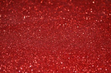 Parıldayan ile parlak ve soyut kırmızı arka plan bulanık glitter