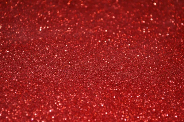 Lyst og abstrakt, rød bakgrunn med glitrende glitter – stockfoto