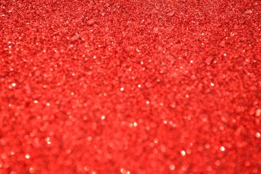 Parıldayan ile parlak ve soyut kırmızı arka plan bulanık glitter
