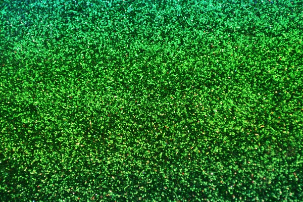 Heller und abstrakter verschwommener grüner Hintergrund mit schimmerndem Glitzern — Stockfoto