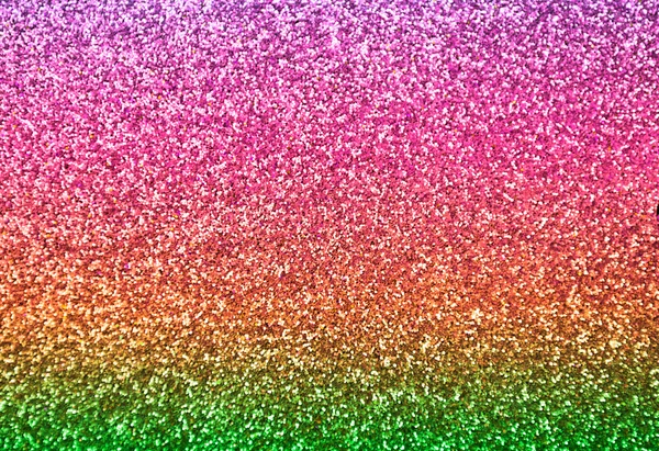 Lumineux et abstrait fond arc-en-ciel coloré flou avec des paillettes chatoyantes — Photo