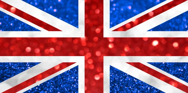 De nationale vlag van het Verenigd Koninkrijk van Groot-Brittannië en Noord-Ierland, algemeen bekend als de Union Jack of Union Flag, gemaakt van helder en abstracte wazig achtergronden met glinsterende glitter — Stockfoto