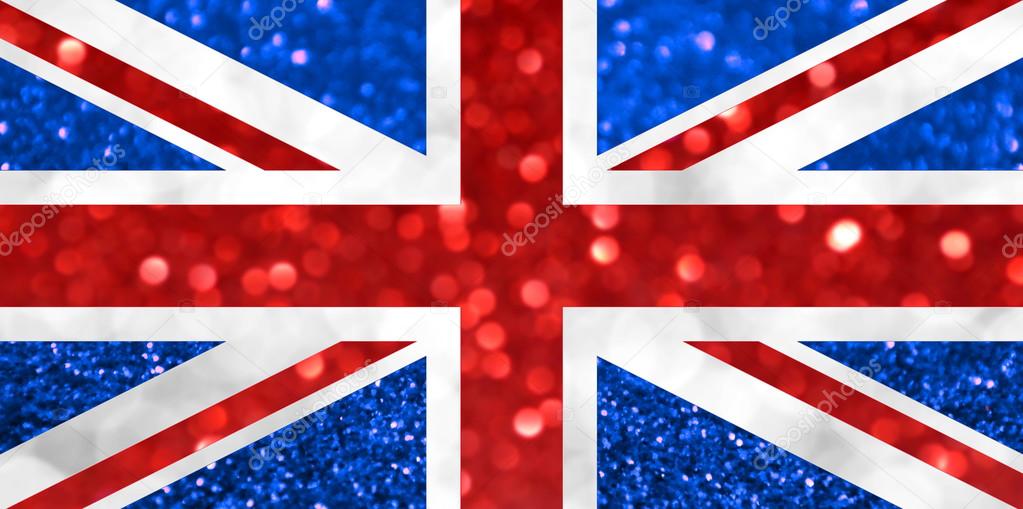 The National flag of the United Kingdom of Great Britain and Northern Ireland, commonly known as the Union Jack or Union Flag, made of bright and abstract blurred backgrounds with shimmering glitter