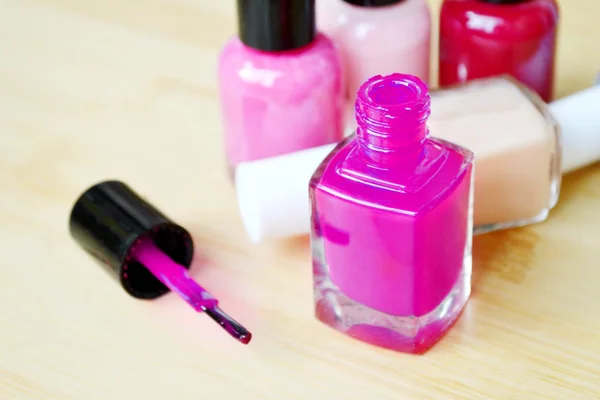 A bottle of violet nail polish closeup — Stock Photo, Image