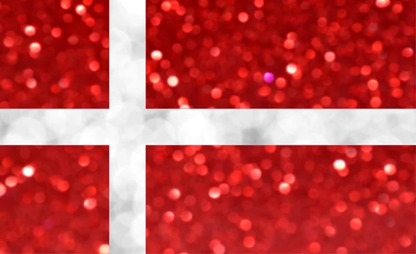 Den nationella flaggan Danmark gjord av ljusa och abstrakt suddiga bakgrunder med skimrande glitter — Stockfoto