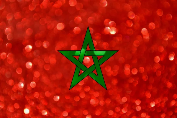 The National flag of the Kingdom of Morocco made of bright and abstract blurred backgrounds with shimmering glitter — Stock Photo, Image