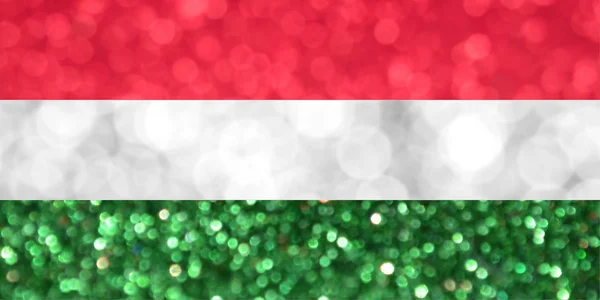 Le drapeau national de la Hongrie fait de milieux flous lumineux et abstraits avec des paillettes chatoyantes — Photo
