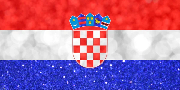 Le drapeau national de la Croatie fait de milieux flous lumineux et abstraits avec des paillettes chatoyantes — Photo