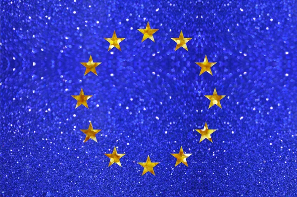 Az Európai Unió hivatalos zászlaja készült világos és absztrakt homályos hátterek, a csillogó glitter — Stock Fotó