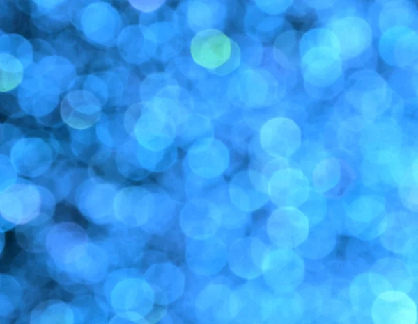Fondo azul borroso brillante y abstracto con brillo brillante — Foto de Stock