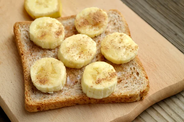 Healthy toast with banana, cinnamon and honey — Stock Photo, Image