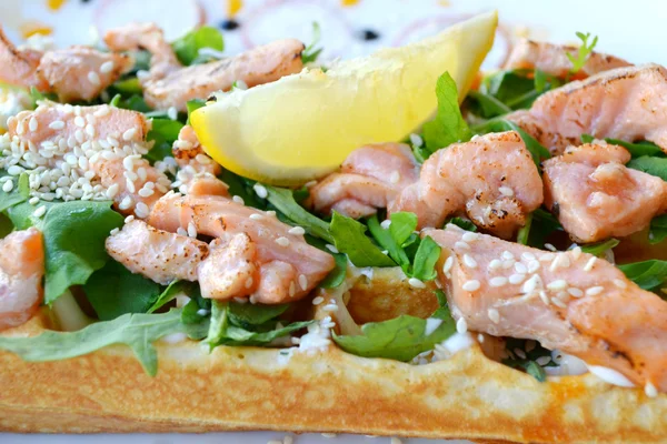 Belgian waffle with arugula, cream sauce and roasted salmon — Stock Photo, Image