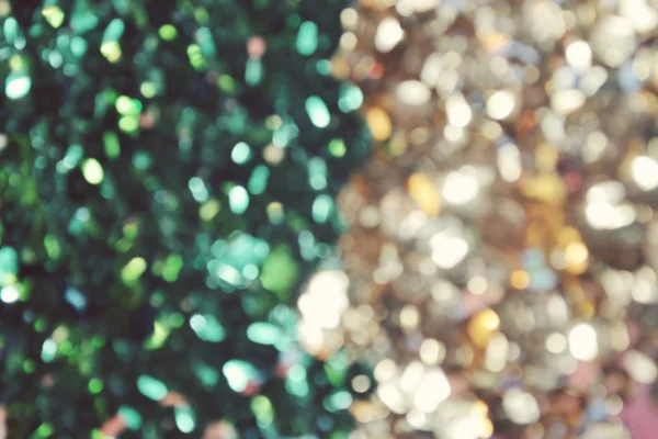 Яскравий і абстрактний розмитий зелений і золотий фон з мерехтливим блиском — стокове фото