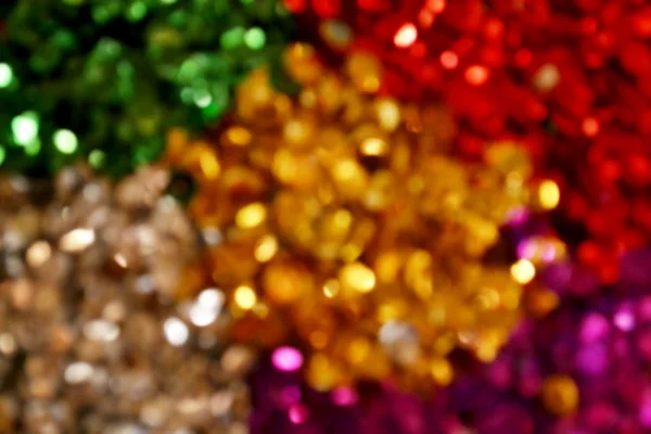 Ljusa och abstrakt suddiga färgglada rainbow bakgrund med skimrande glitter — Stockfoto