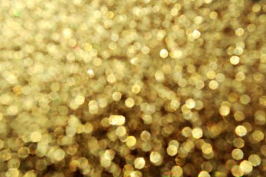 Parıldayan ile parlak ve soyut yıldız altın arka plan bulanık glitter