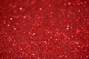 Parıldayan ile parlak ve soyut kırmızı arka plan bulanık glitter