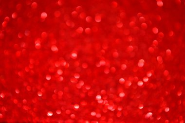 Parıldayan ile parlak ve soyut kırmızı arka plan bulanık glitter