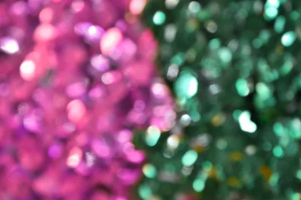 Helder en abstracte wazig groen en violet achtergrond met glinsterende glitter — Stockfoto