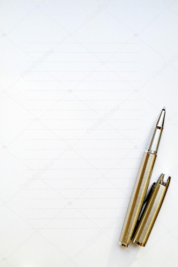 Empty sheet of white paper with a pen