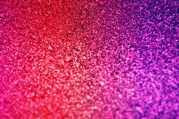 Bright and abstract blurred sea blue, red and violet background with shimmering glitter — Stock Photo, Image