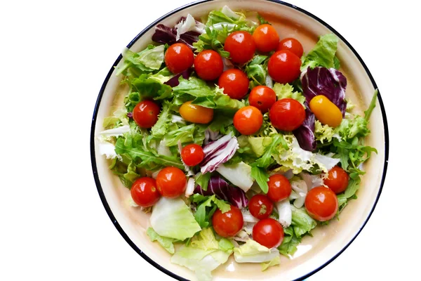 Νόστιμο χορτοφάγος σαλάτα με κόκκινο και κίτρινο ντοματίνια, ρόκα, λάχανο και μαρούλι — Φωτογραφία Αρχείου