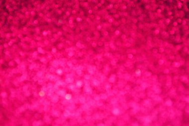 Parıldayan ile parlak ve soyut pembe arka plan bulanık glitter