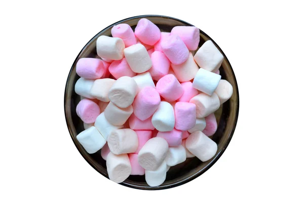 Un sacco di piccoli marshmallow bianchi e rosa in una tazza isolata su bianco — Foto Stock
