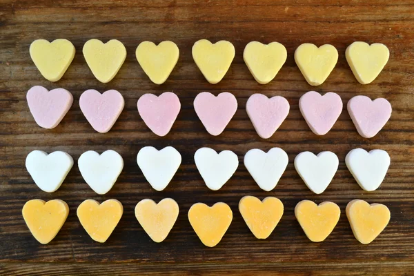 Small cute heart candies of different colours — Stock Photo, Image