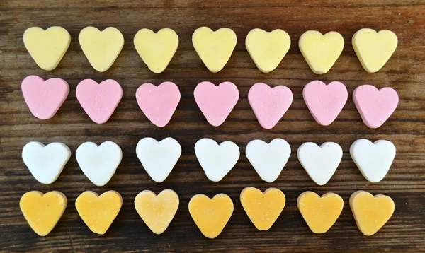 Small cute heart candies of different colours — Stock Photo, Image