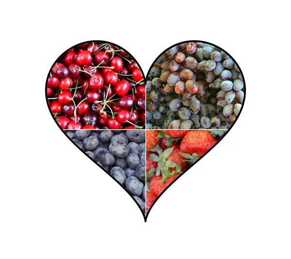 Kollázs, egészséges szerves bogyók alakja szív - eper, áfonya, meggy, szőlő — Stock Fotó