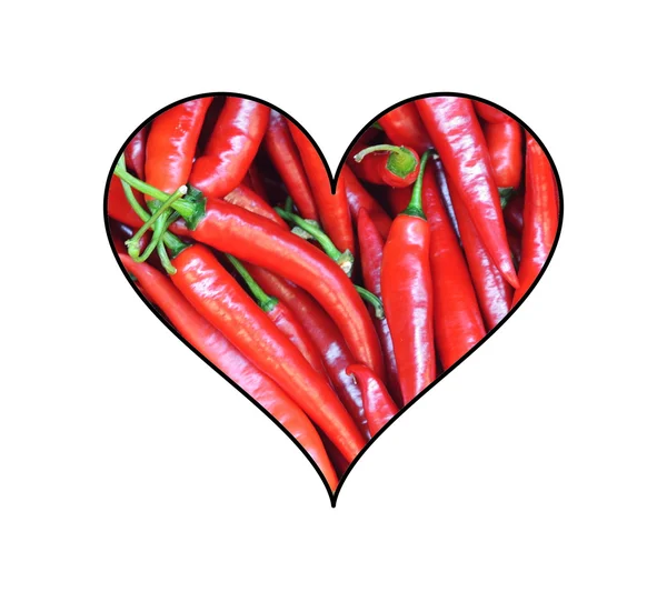 Muchos chiles rojos en forma de corazón aislados en blanco — Foto de Stock