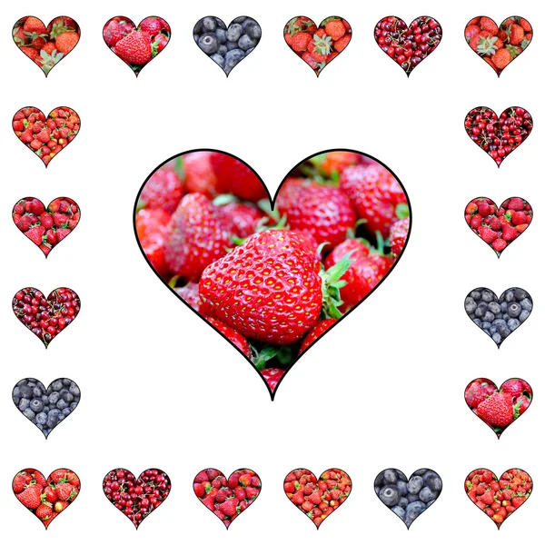 Lots of fresh and tasty dark sweet strawberries in shape of heart isolated on white — Stock Photo, Image