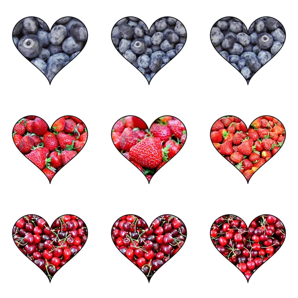Collage of healthy organic berries in shape of heart - strawberries, blueberries, cherries, grapes — Stock Photo, Image