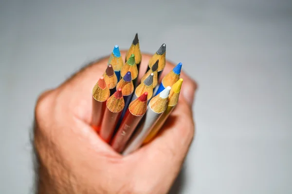 Hand holding pencil — Stock Photo, Image