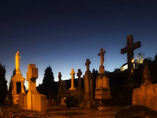 Cemetery crosses at night