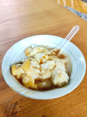Traditional Indonesian Rice Pudding With Sweet Palm Sugar Syrup