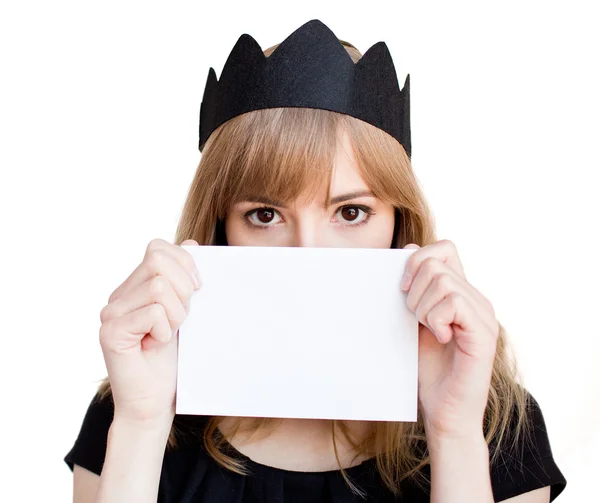 Woman  holds white blank paper — Stock Photo, Image